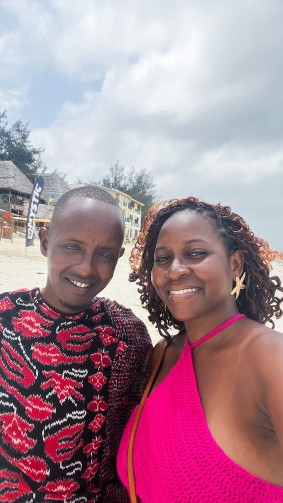 me & a masaai on the beach in Jambiani
